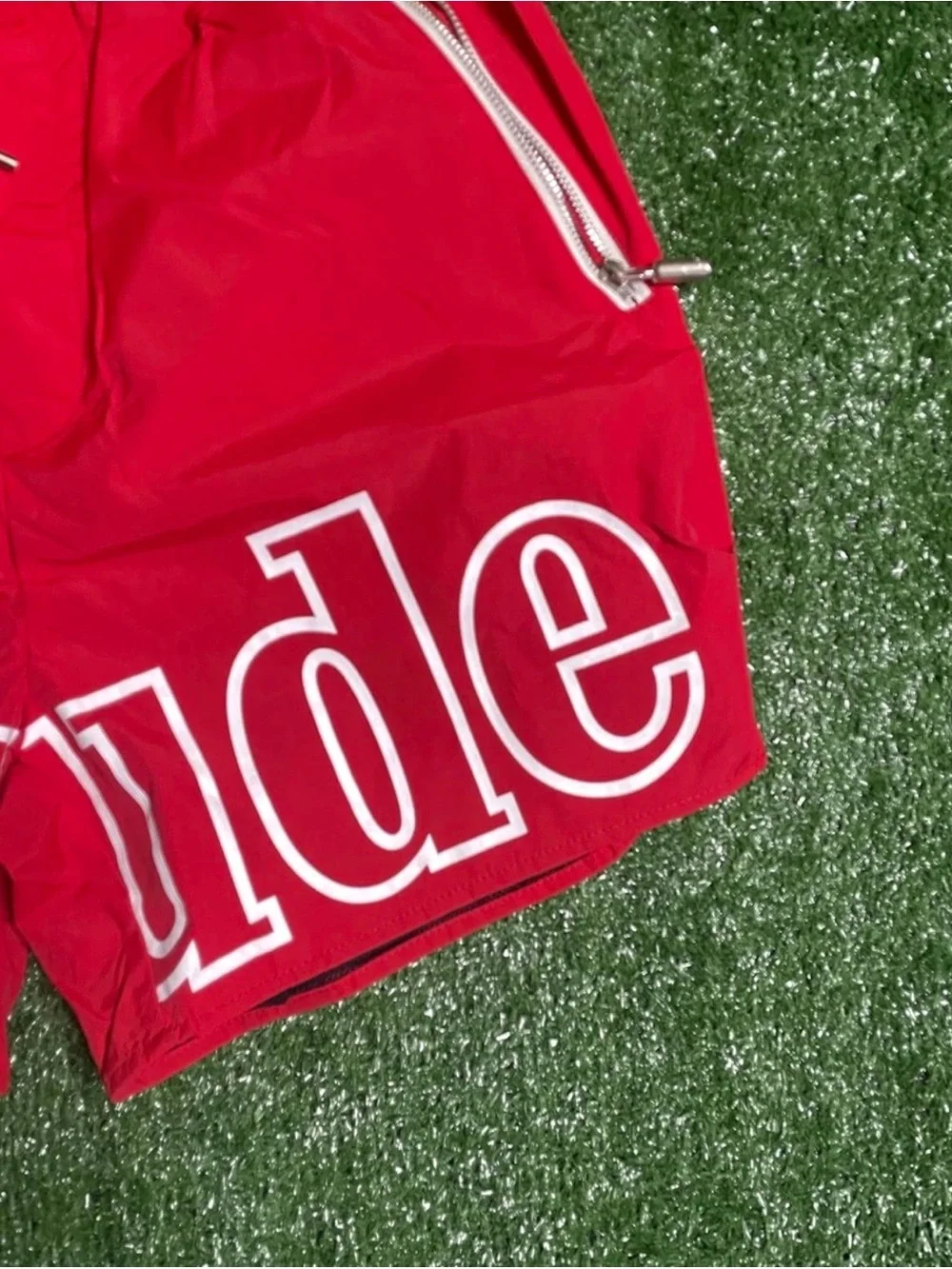 Rhude Red Swim Shorts with White Logo and Yellow Drawstring